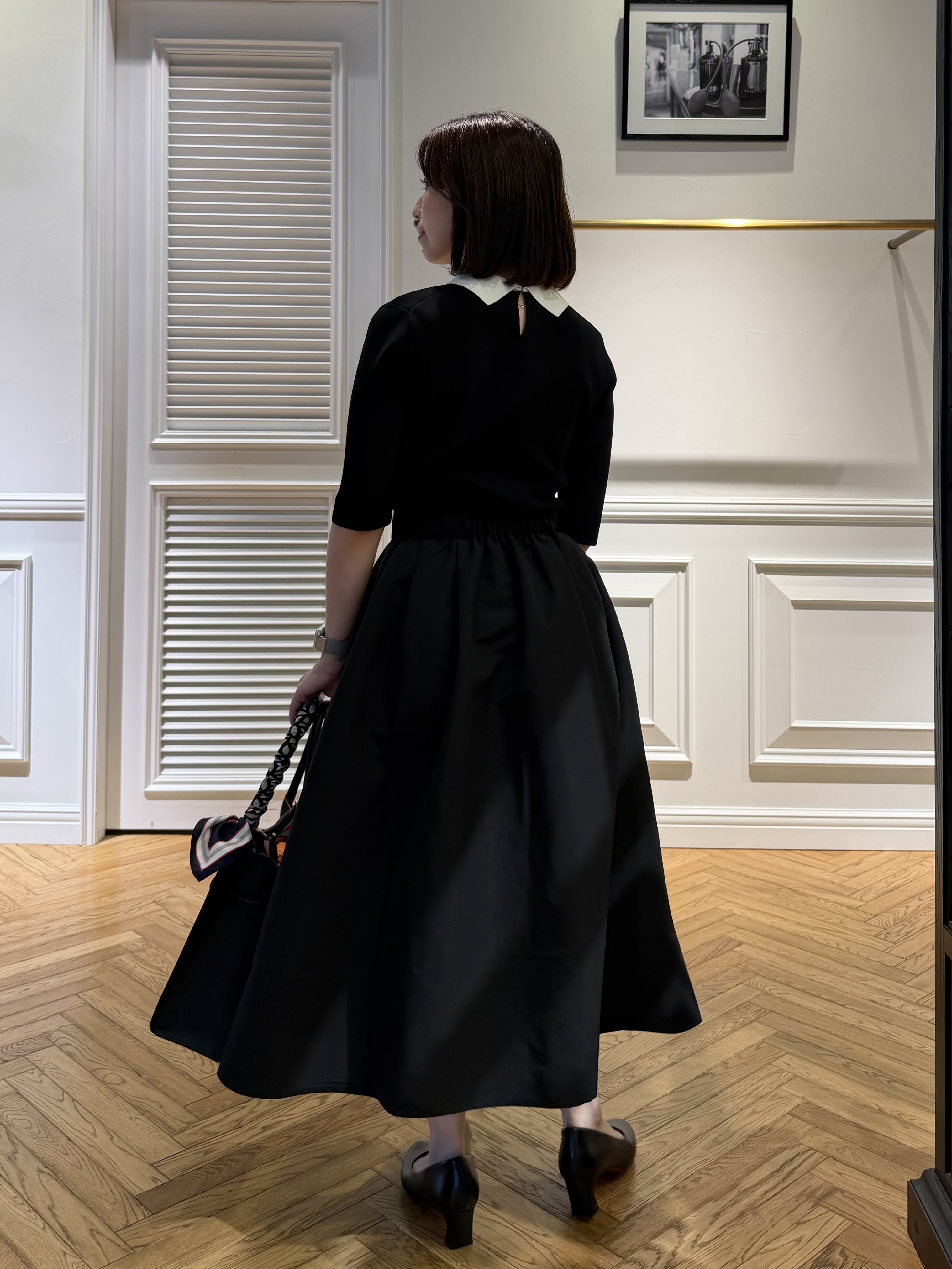 つじ まこさんの「DRESSTERIOR｜バイカラーニットコンビワンピース」を使ったコーディネート