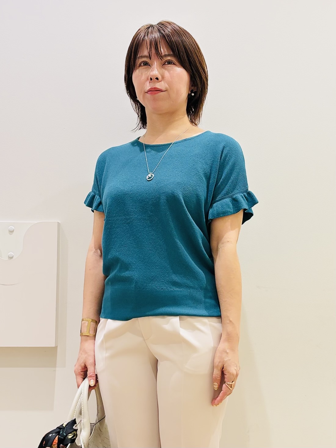 YUKOさんの「index｜フリルスリーブニット【洗濯機OK】」を使ったコーディネート