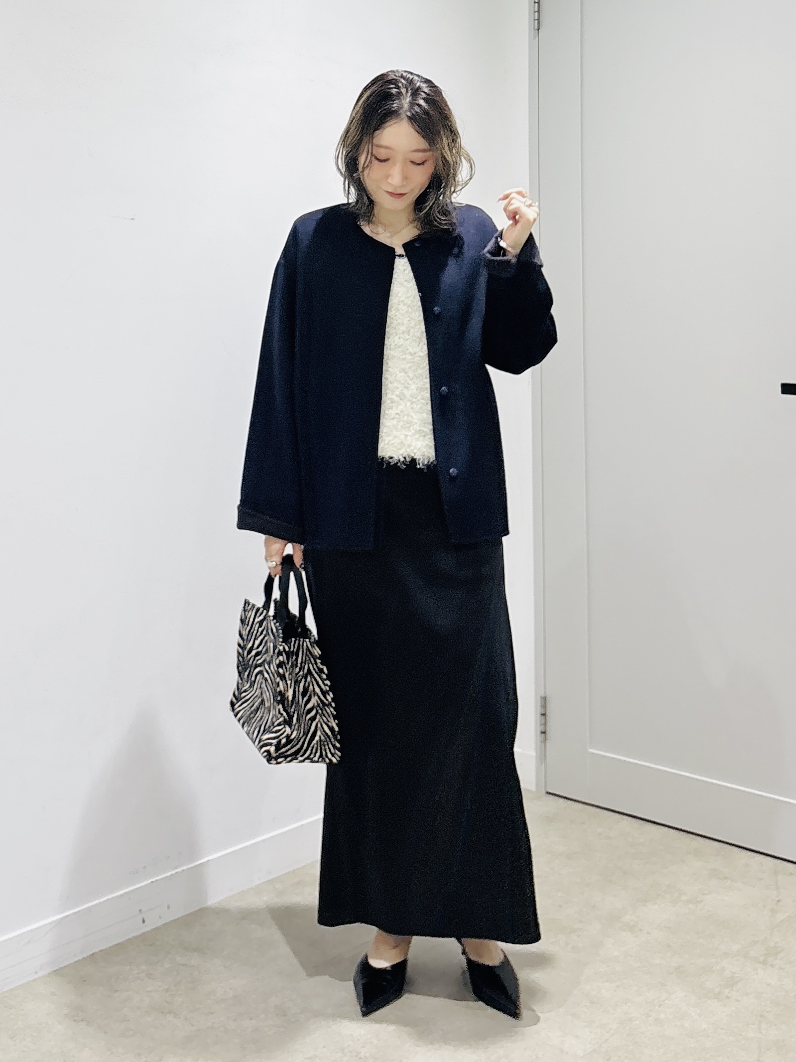 kotakiさんの「INDIVI｜【洗える】ファンシーヤーンVネックニットベスト」を使ったコーディネート