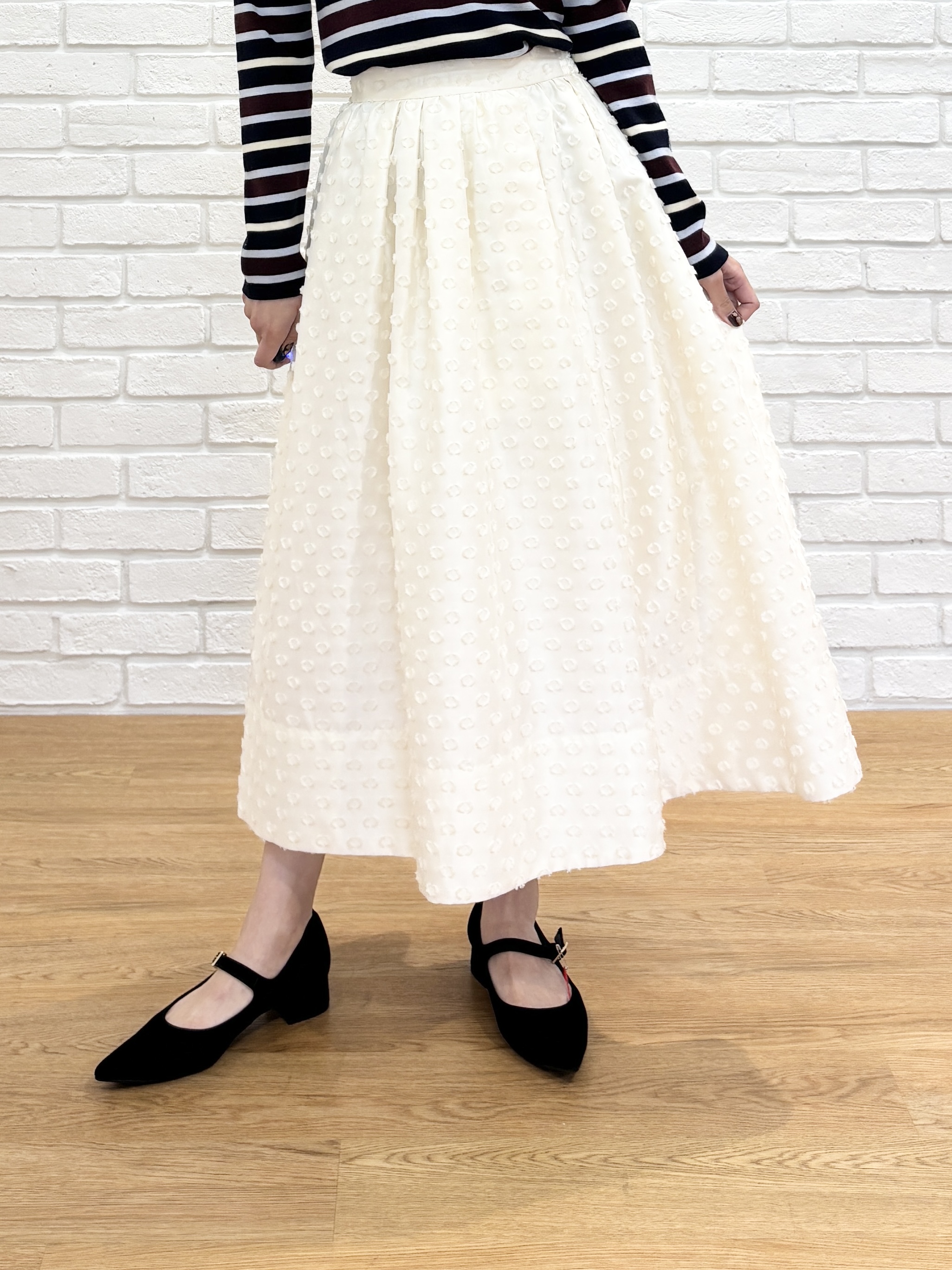 清水夏姫さんの「DRESSTERIOR｜カットジャガードボリュームスカート」を使ったコーディネート