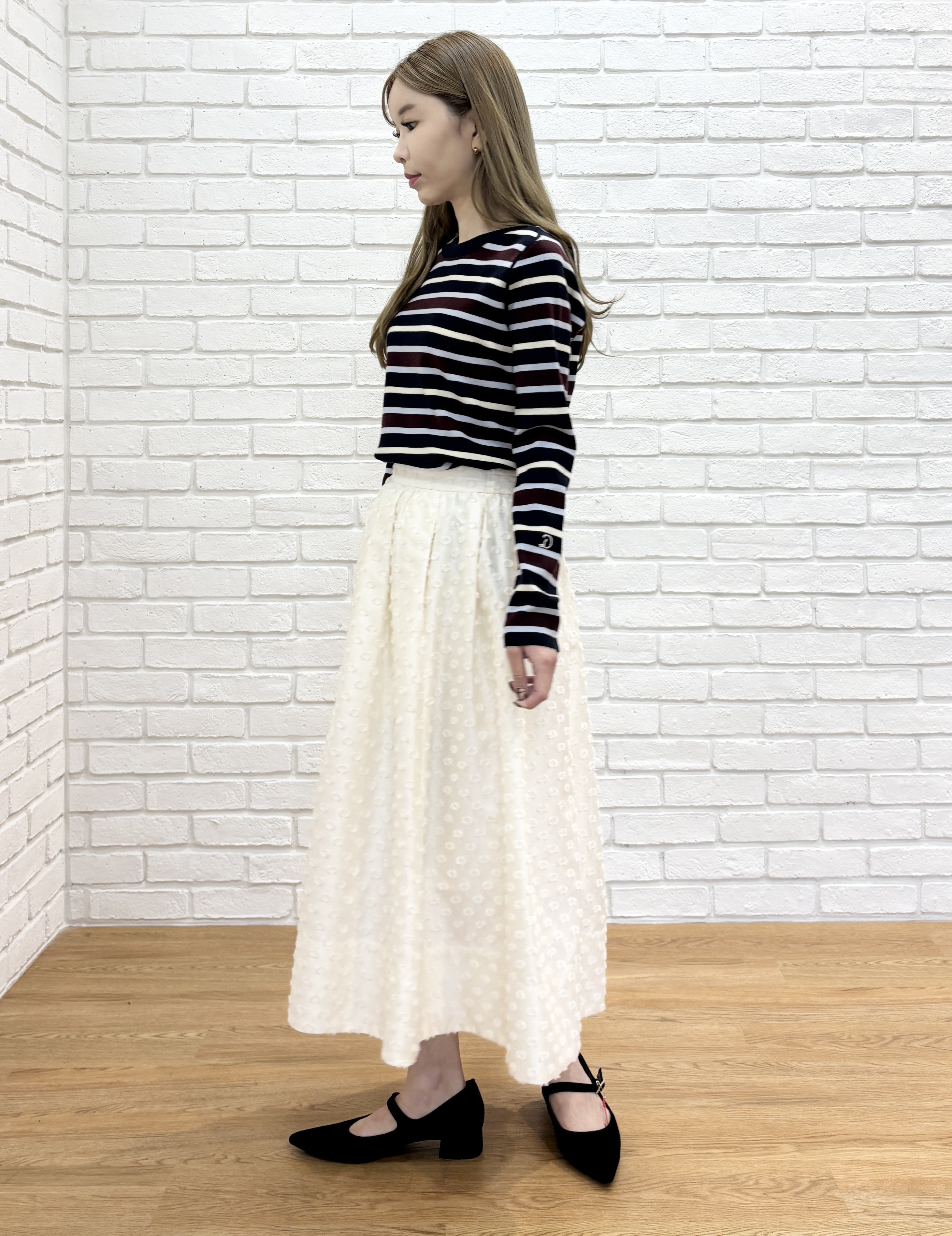 清水夏姫さんの「DRESSTERIOR｜カットジャガードボリュームスカート」を使ったコーディネート