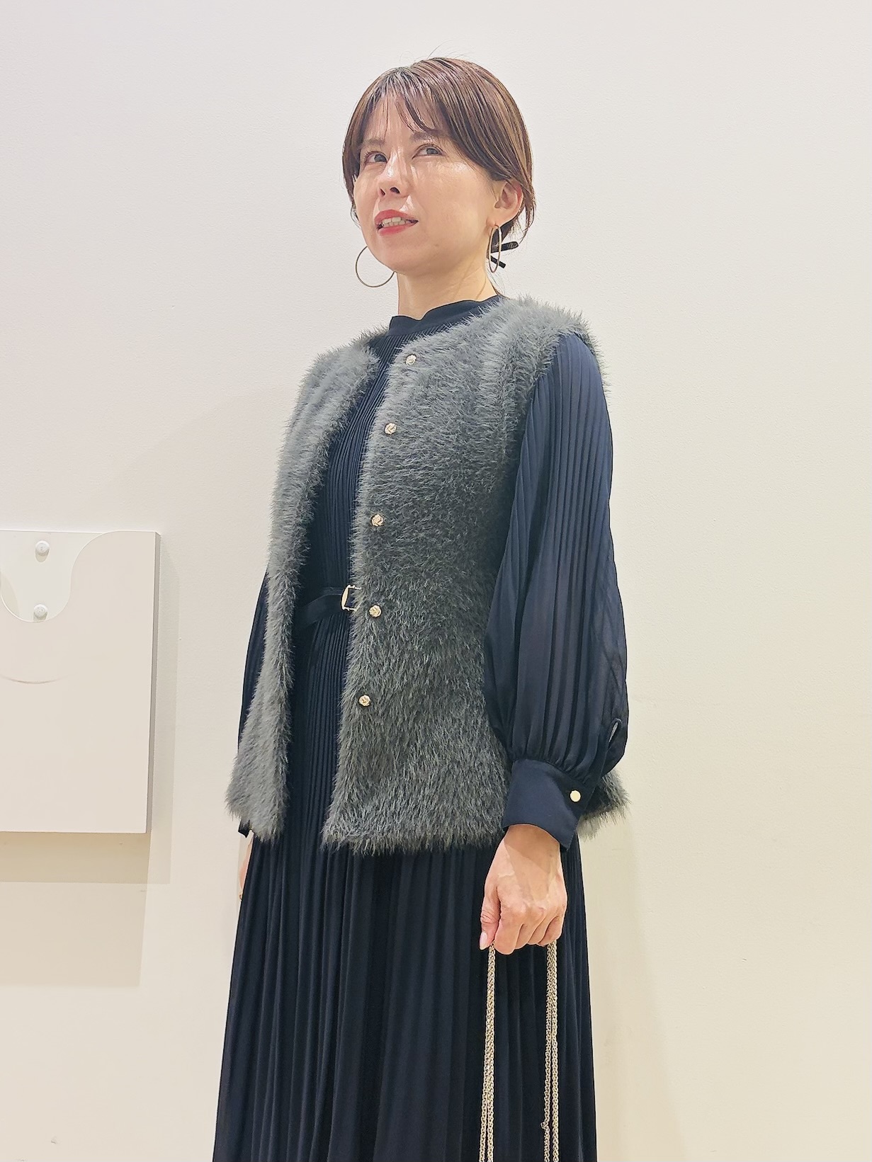 YUKOさんの「index｜フェザーニットペプラムジレ【洗濯機OK】」を使ったコーディネート