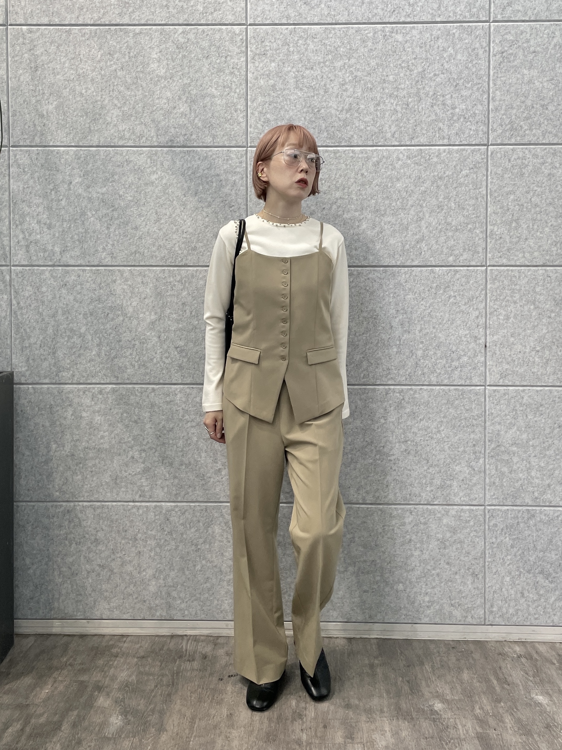 mikuさんの「INDIVI｜【MILLELA FIRENZE】スタッズ付き巾着レザーバッグ」を使ったコーディネート
