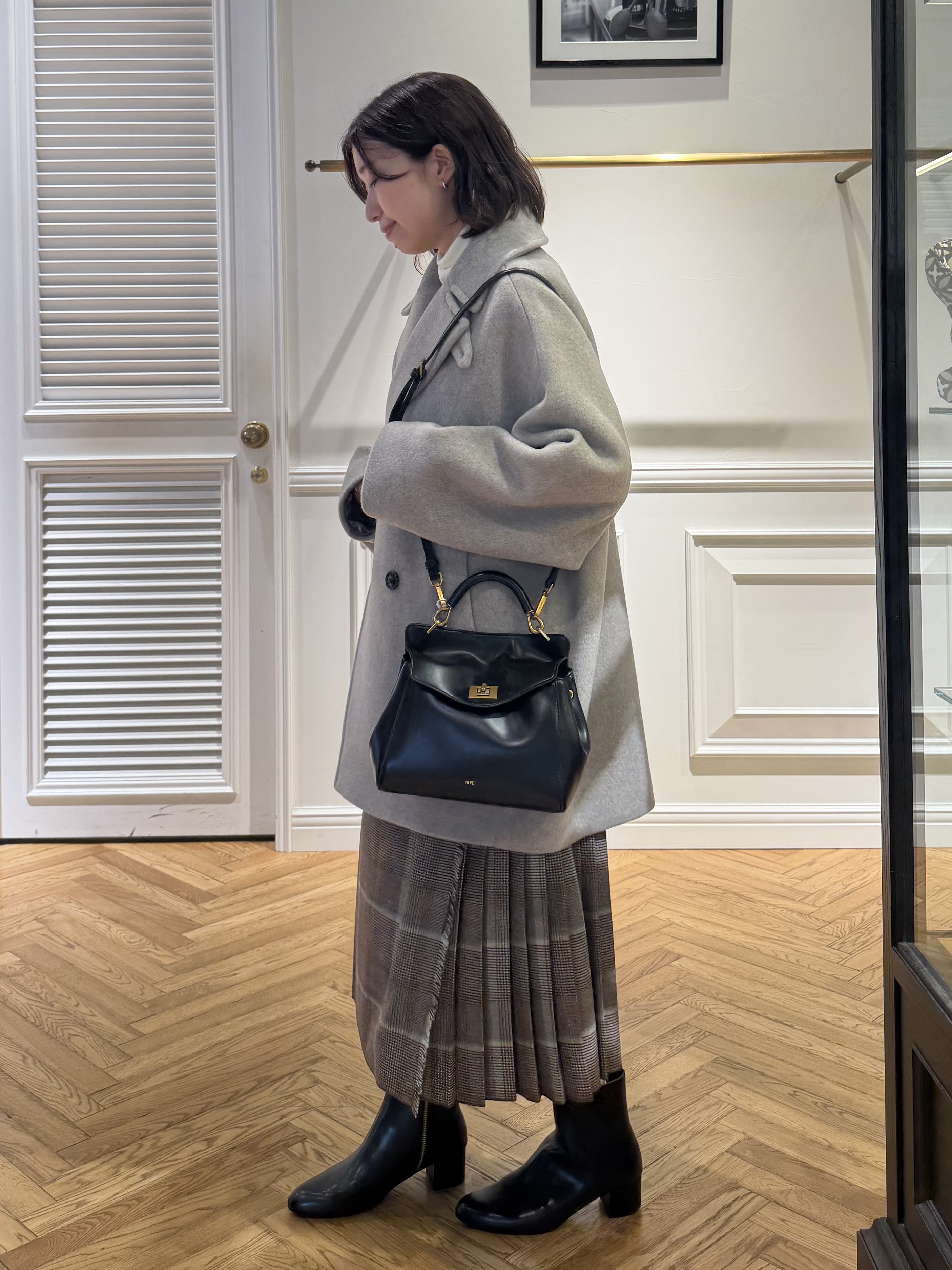 つじ まこさんの「DRESSTERIOR｜ホカウル タートルネック」を使ったコーディネート