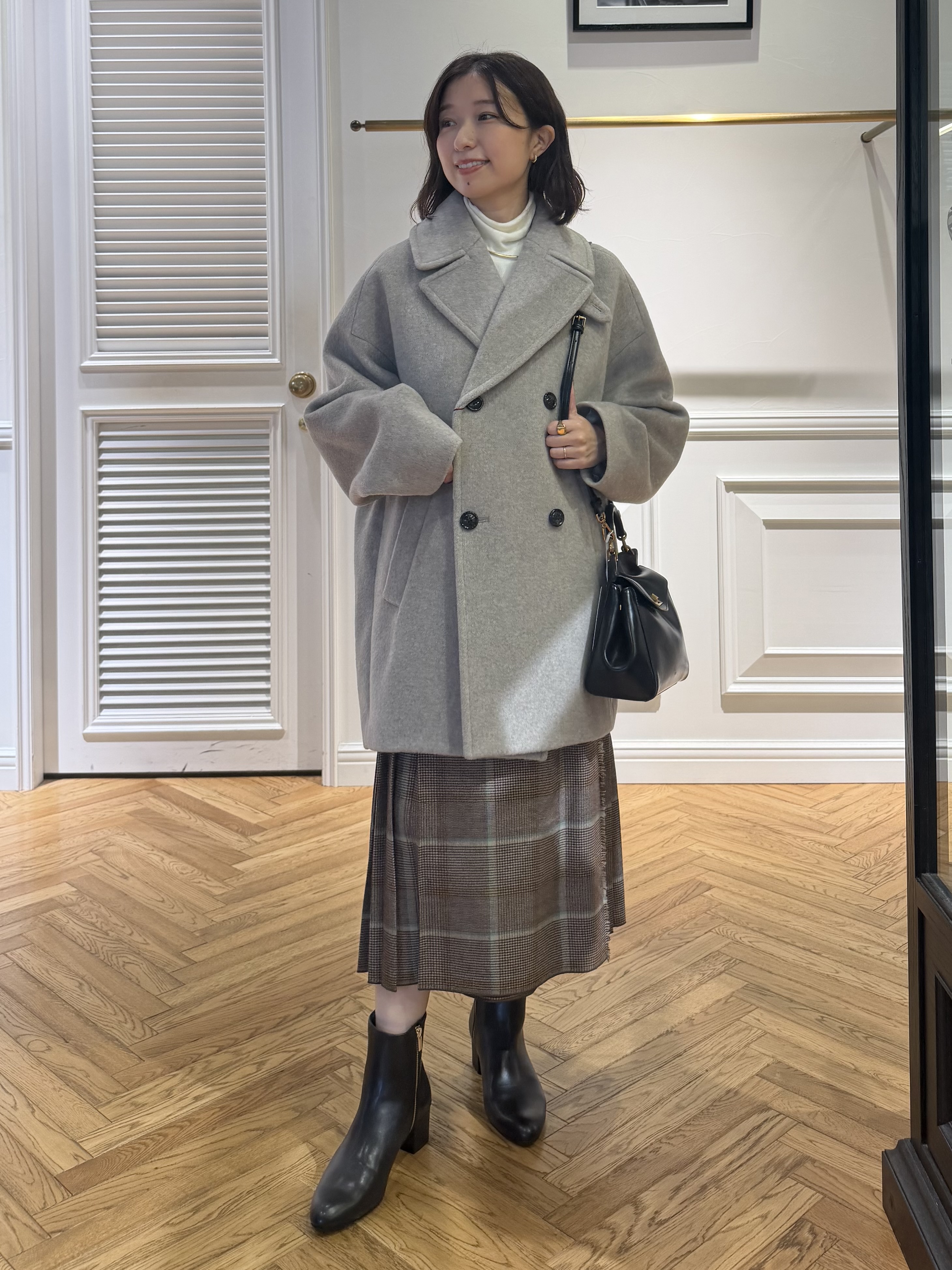 つじ まこさんの「DRESSTERIOR｜ホカウル タートルネック」を使ったコーディネート