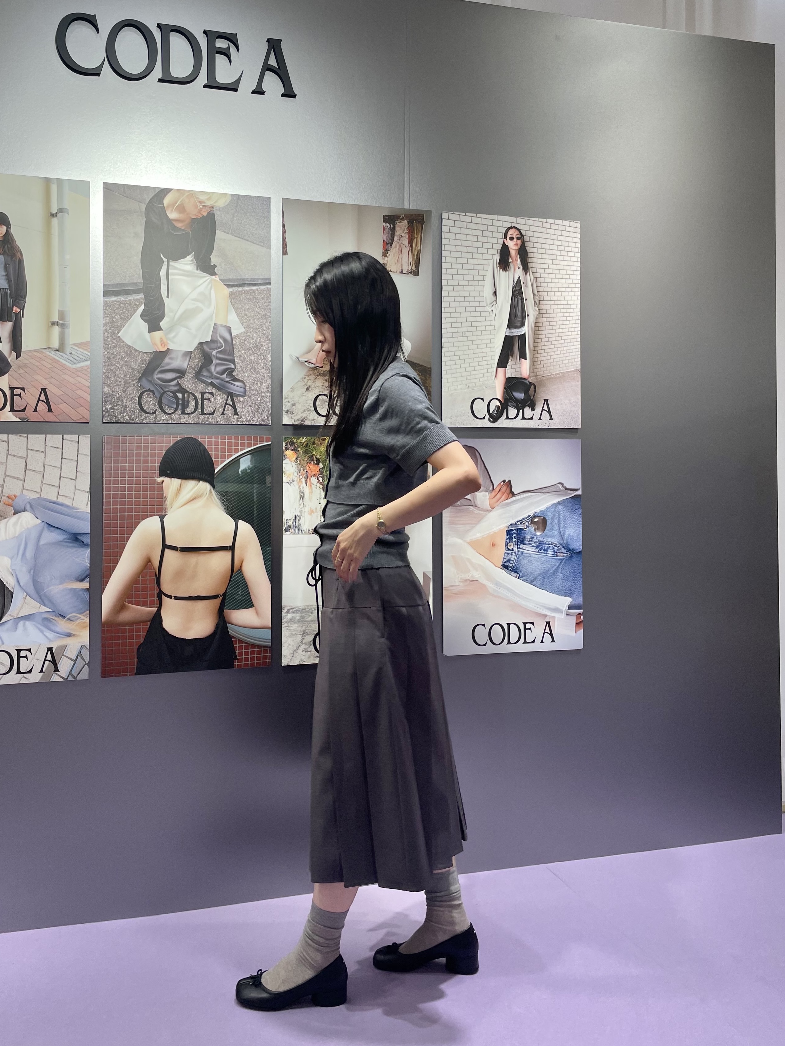 丸山加奈子さんの「CODE A｜modular button knit cardigan」を使ったコーディネート
