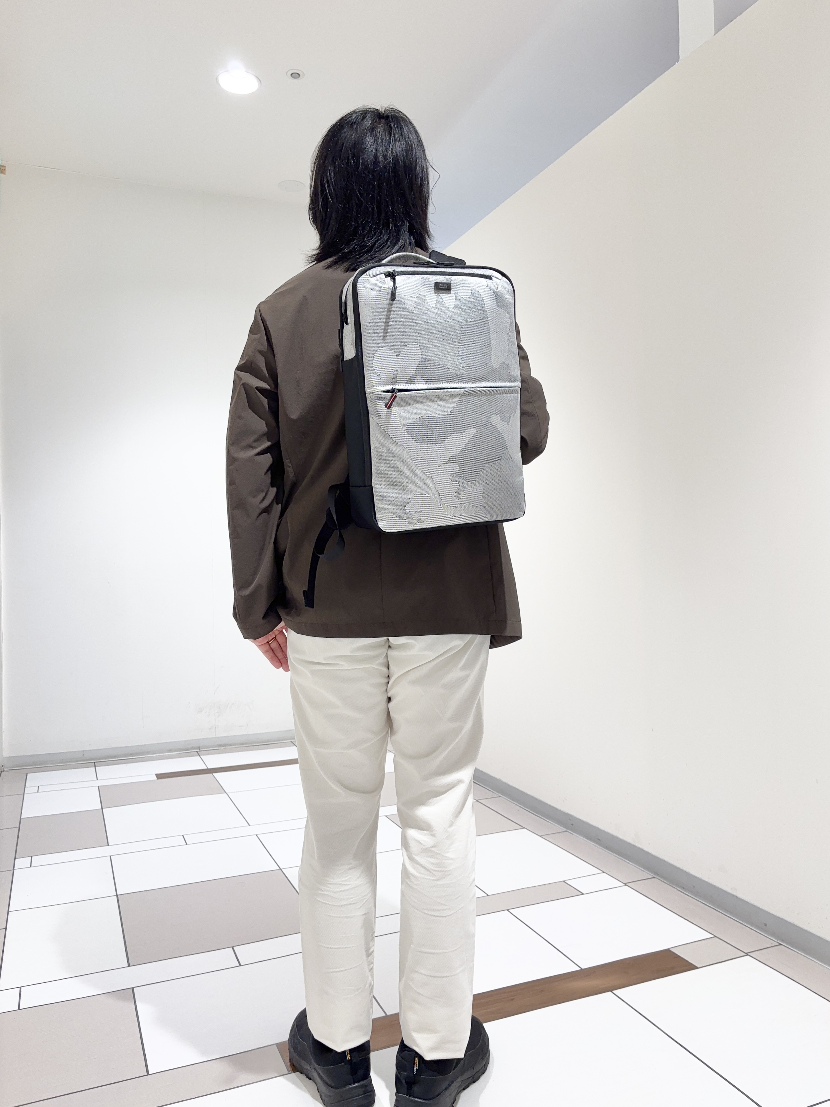 及川さんの「TAKEO KIKUCHI｜3Dナイロンストレッチ ジャケット」を使ったコーディネート