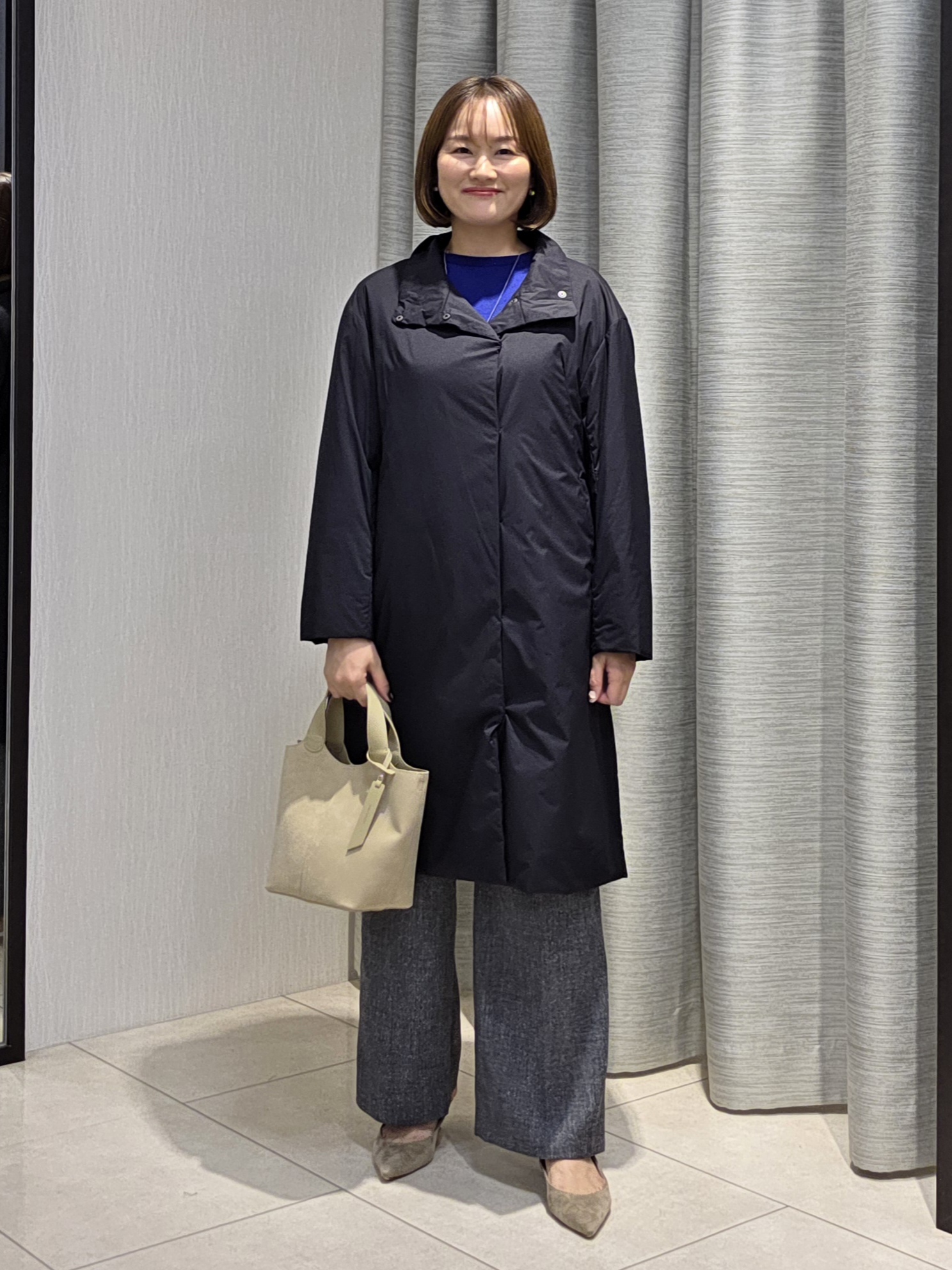 naokoさんの「UNTITLED｜【撥水/軽量/薄中綿入り】スタンドカラーコート」を使ったコーディネート