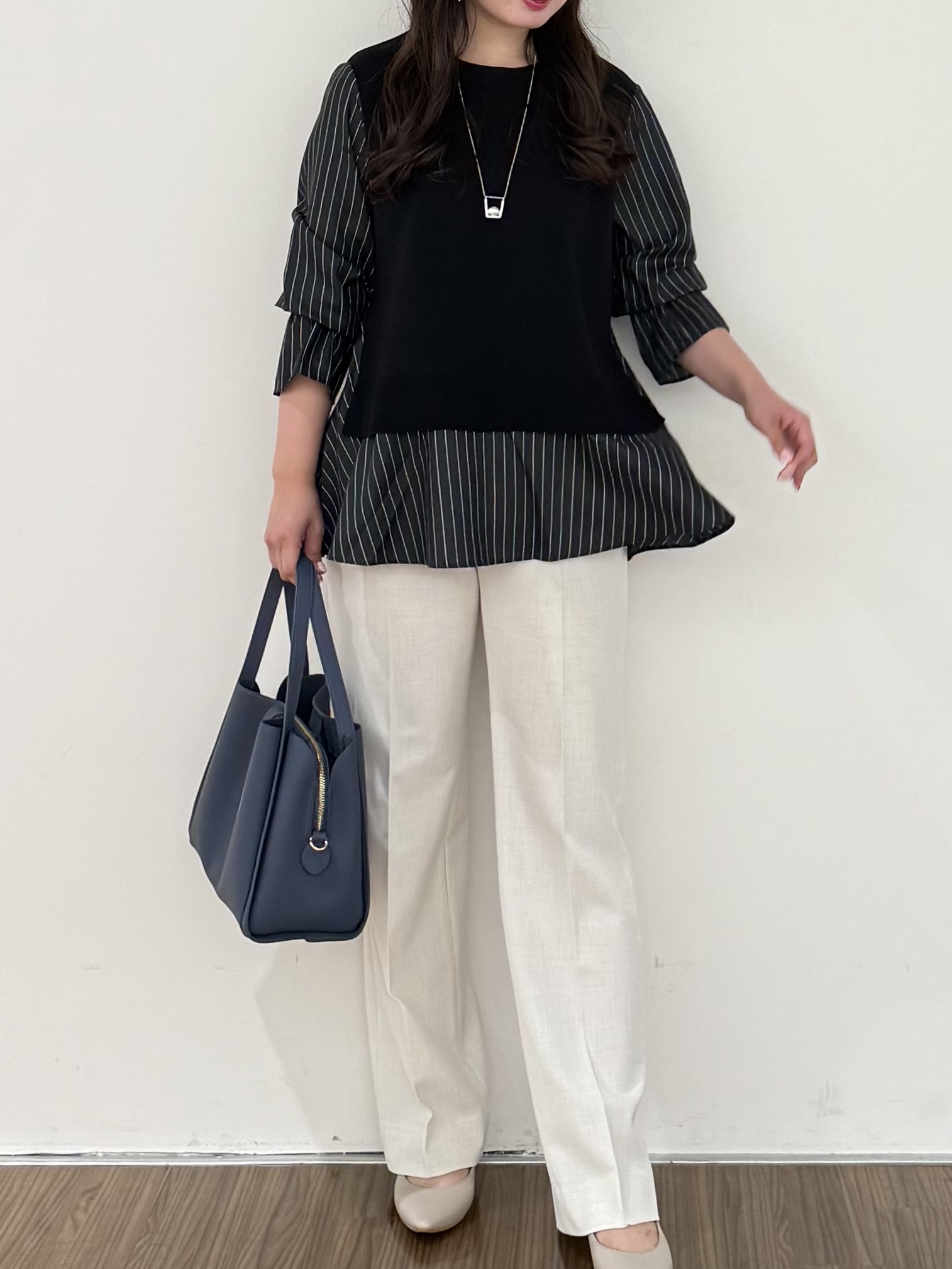 いくみさんの「INDIVI｜【洗える／1枚でコーデ完成】重ね着風ニットトップス」を使ったコーディネート