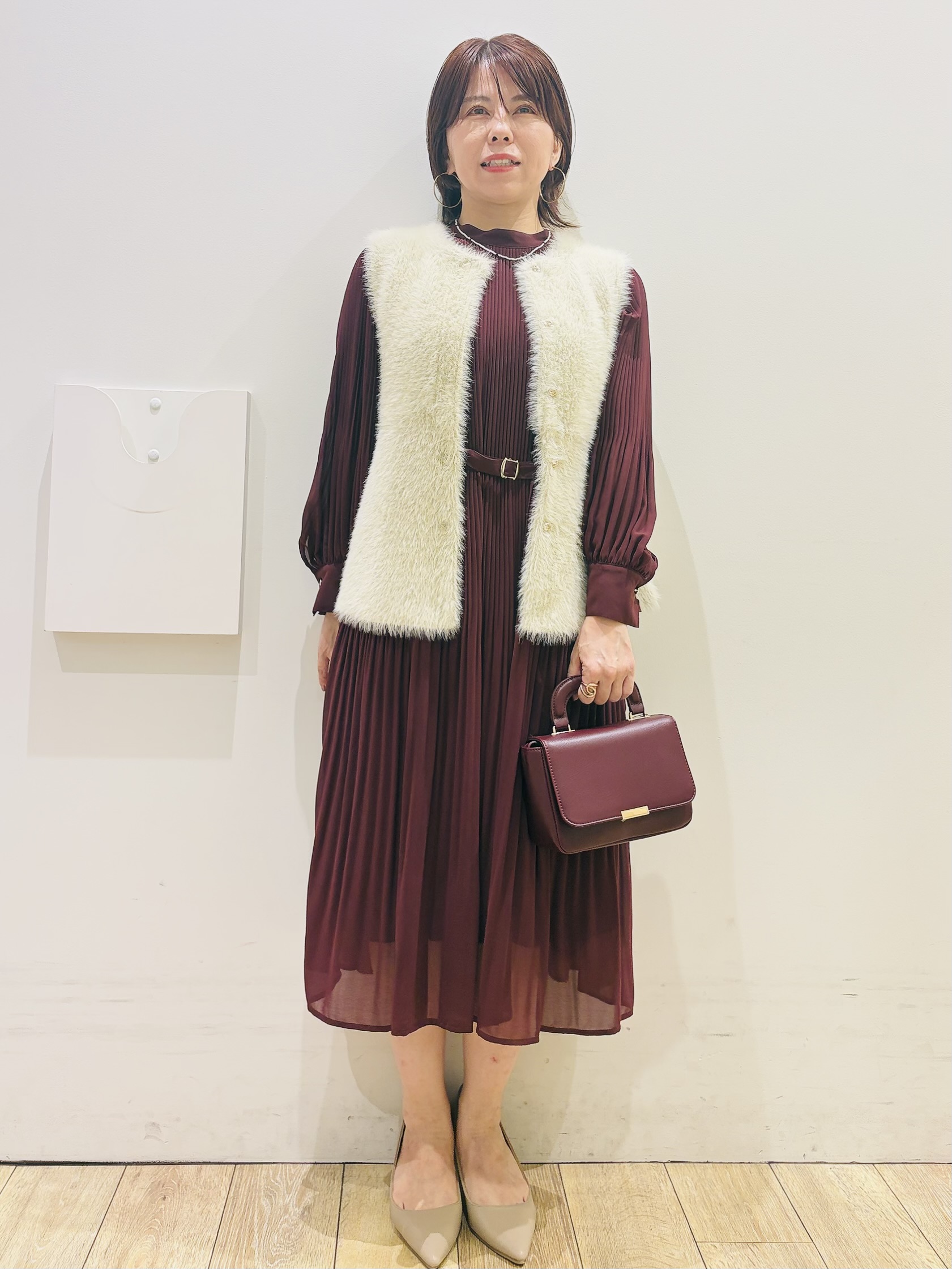 YUKOさんの「index｜フェザーニットペプラムジレ【洗濯機OK】」を使ったコーディネート