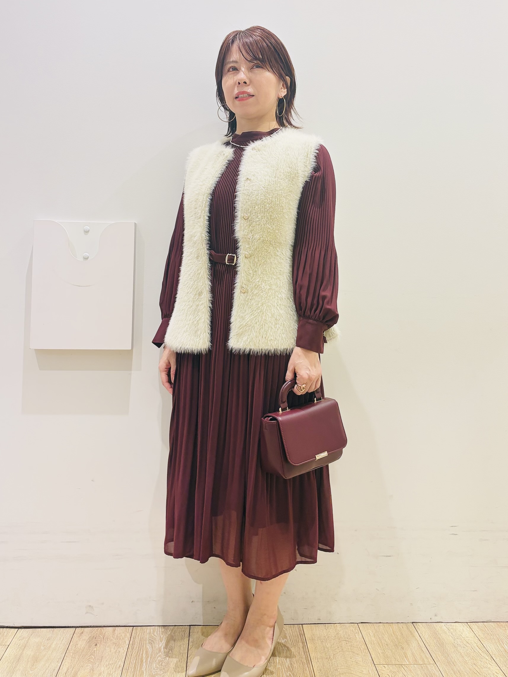 YUKOさんの「index｜フェザーニットペプラムジレ【洗濯機OK】」を使ったコーディネート