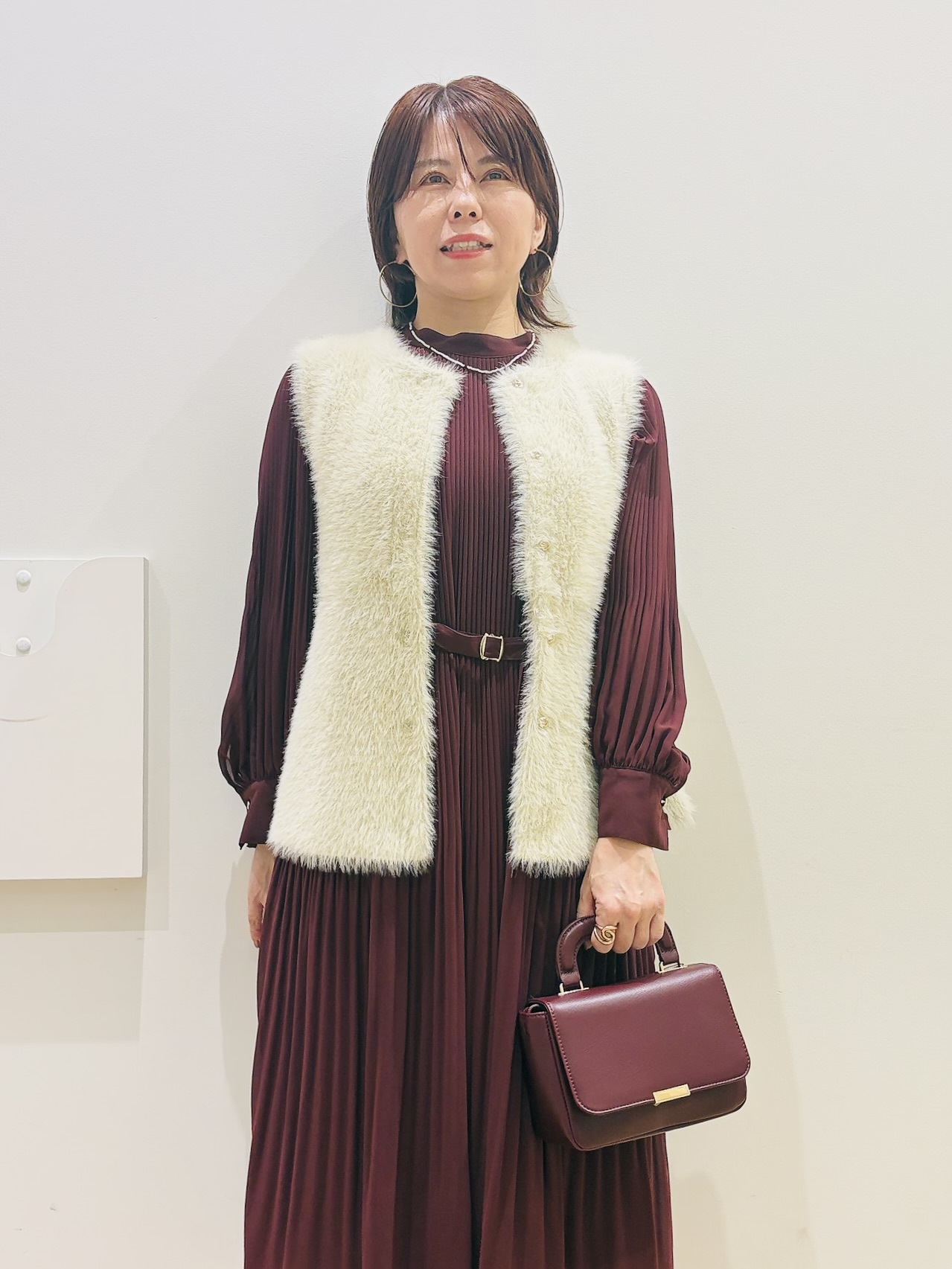 YUKOさんの「index｜フェザーニットペプラムジレ【洗濯機OK】」を使ったコーディネート