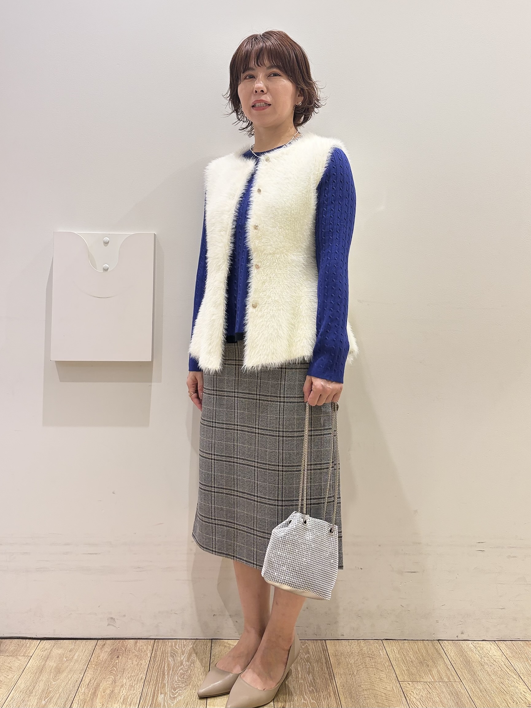 YUKOさんの「index｜バイカラーケーブルペプラムニット【洗濯機OK】」を使ったコーディネート