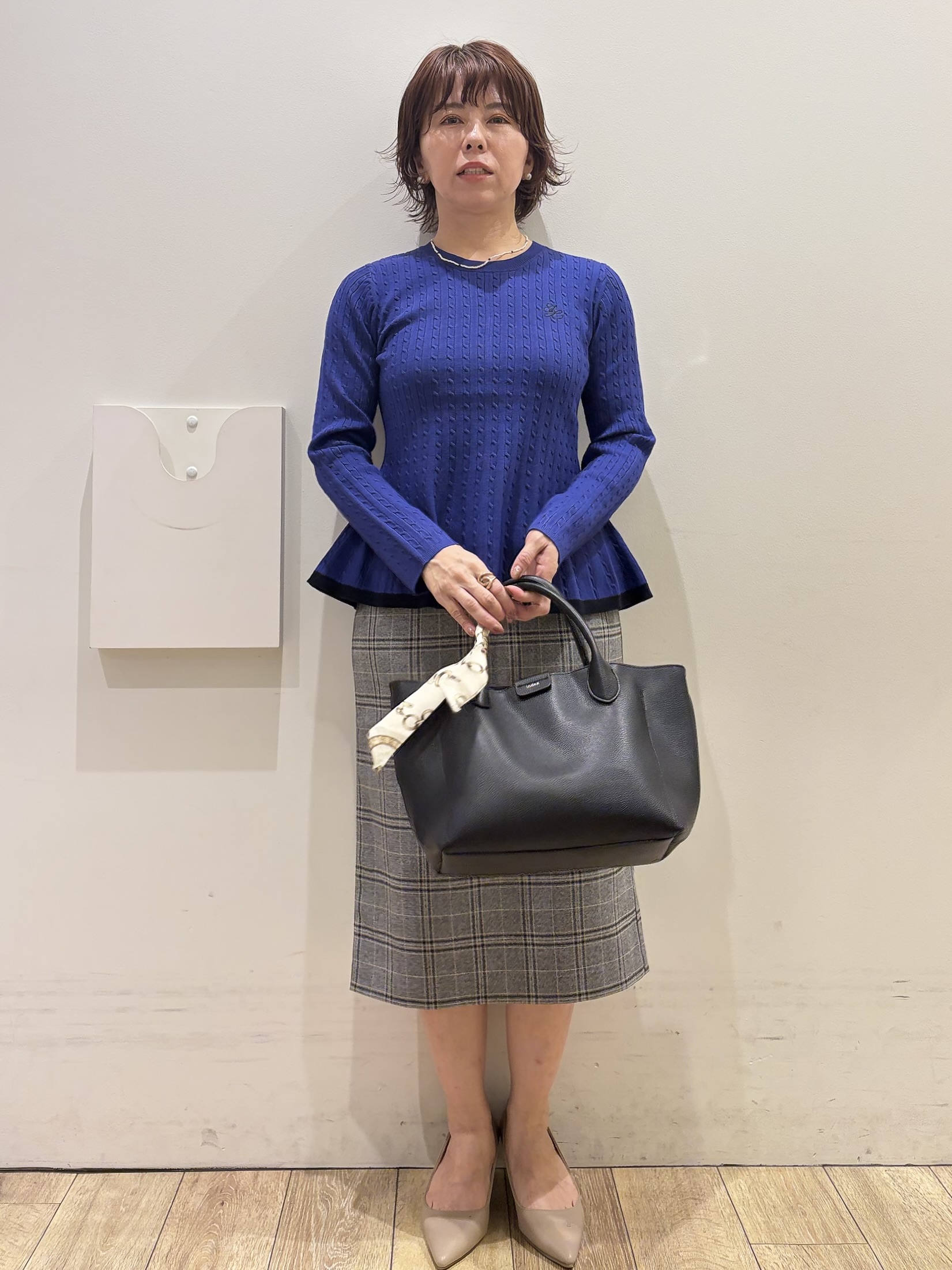 YUKOさんの「index｜バイカラーケーブルペプラムニット【洗濯機OK】」を使ったコーディネート