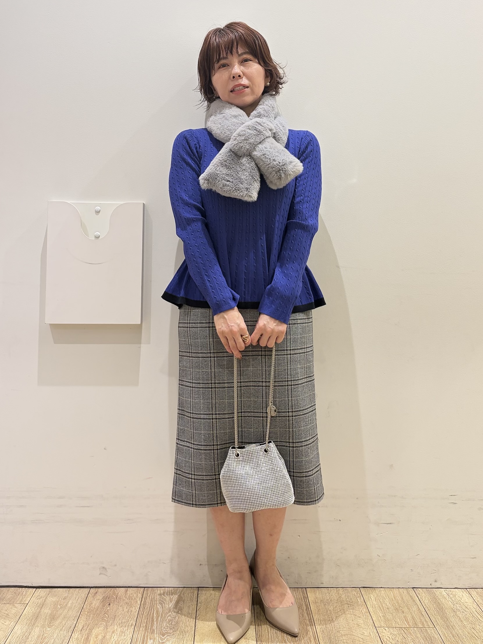YUKOさんの「index｜バイカラーケーブルペプラムニット【洗濯機OK】」を使ったコーディネート
