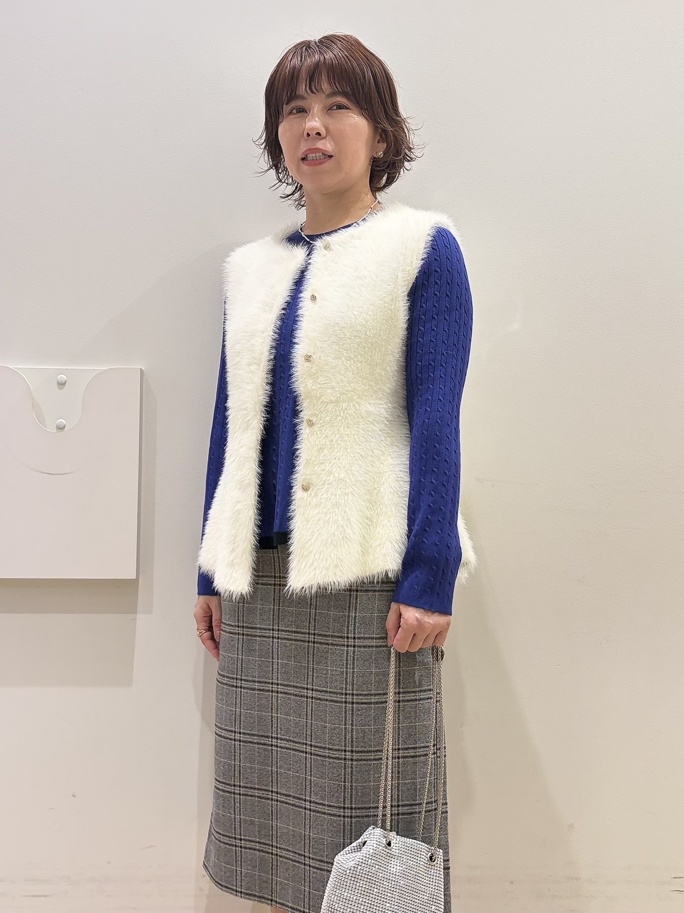 YUKOさんの「index｜フェザーニットペプラムジレ【洗濯機OK】」を使ったコーディネート