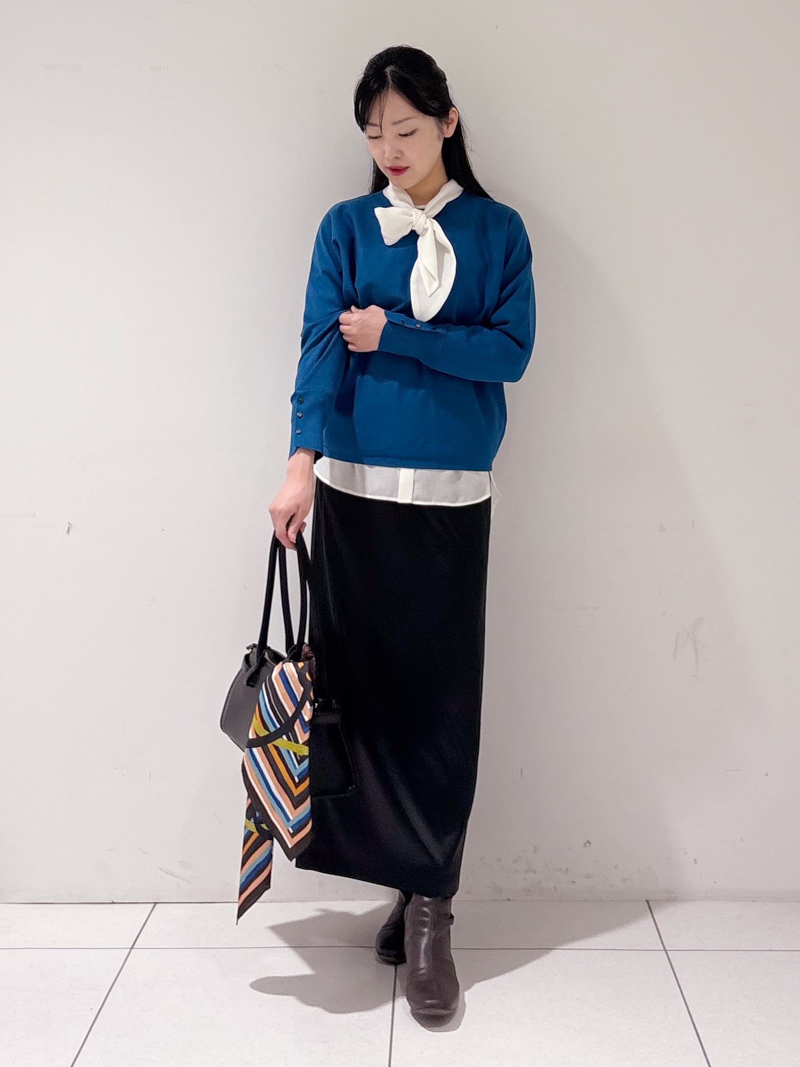 momokoさんの「INDIVI｜【選べる6色／ストレッチ◎】きれいめドルマンスリーブニット」を使ったコーディネート