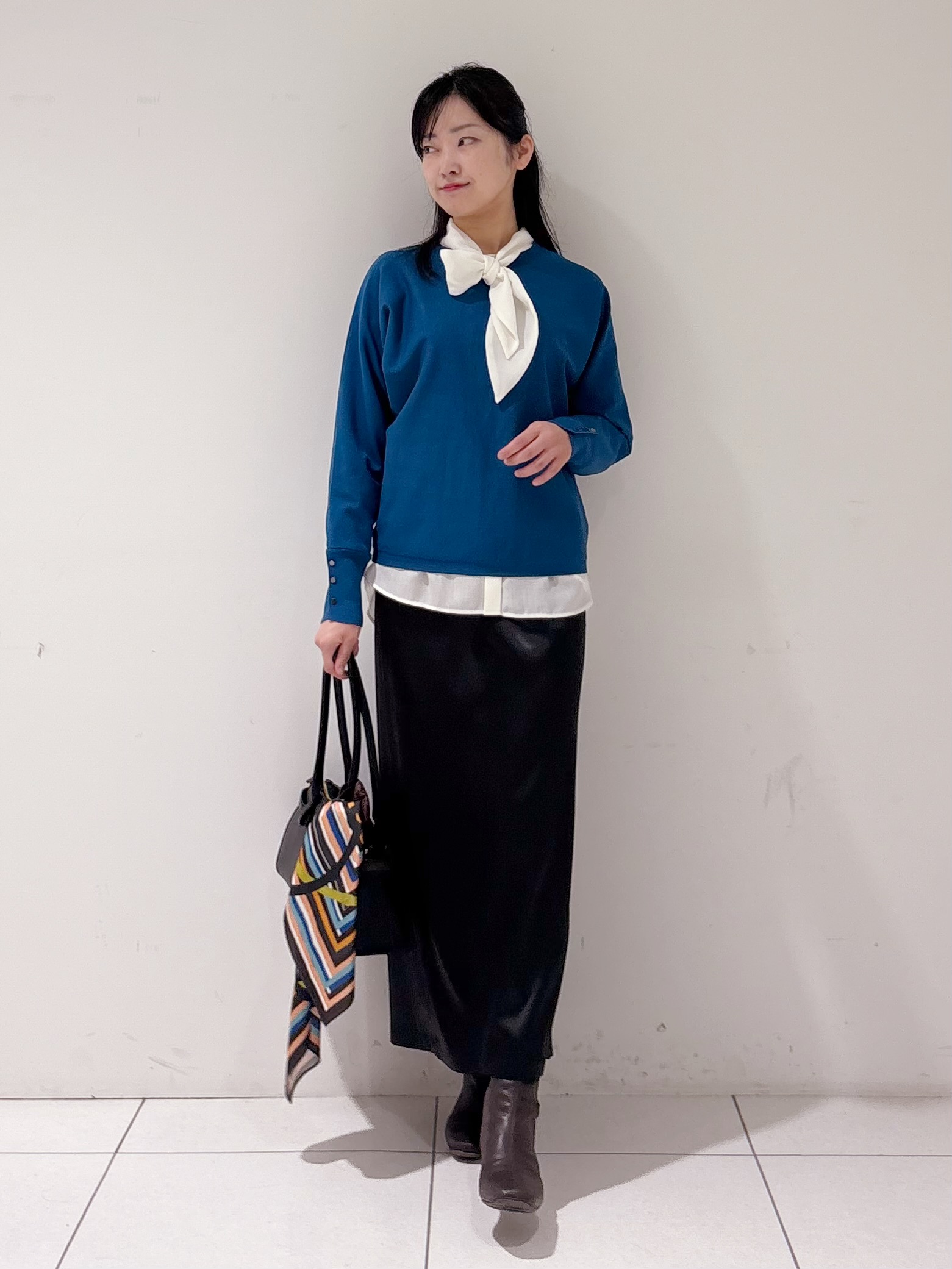 momokoさんの「INDIVI｜【選べる6色／ストレッチ◎】きれいめドルマンスリーブニット」を使ったコーディネート