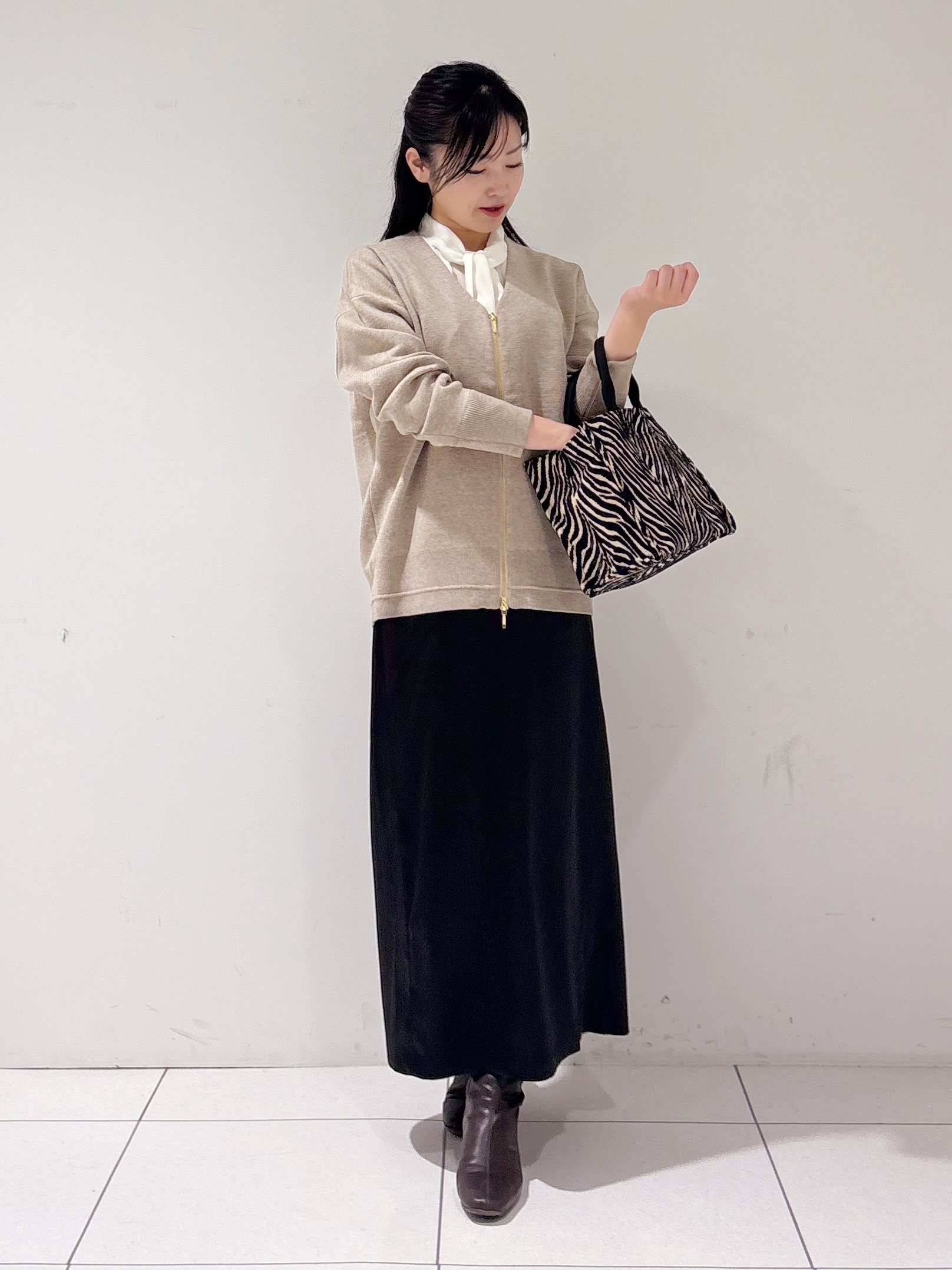 momokoさんの「INDIVI｜【ミラノリブ編み】ジップニットブルゾン」を使ったコーディネート