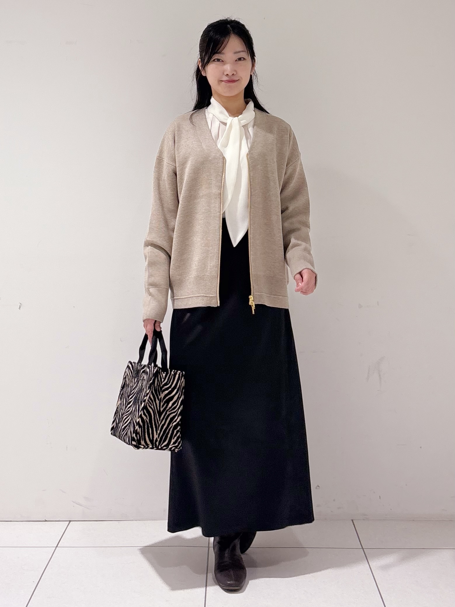 momokoさんの「INDIVI｜【ミラノリブ編み】ジップニットブルゾン」を使ったコーディネート