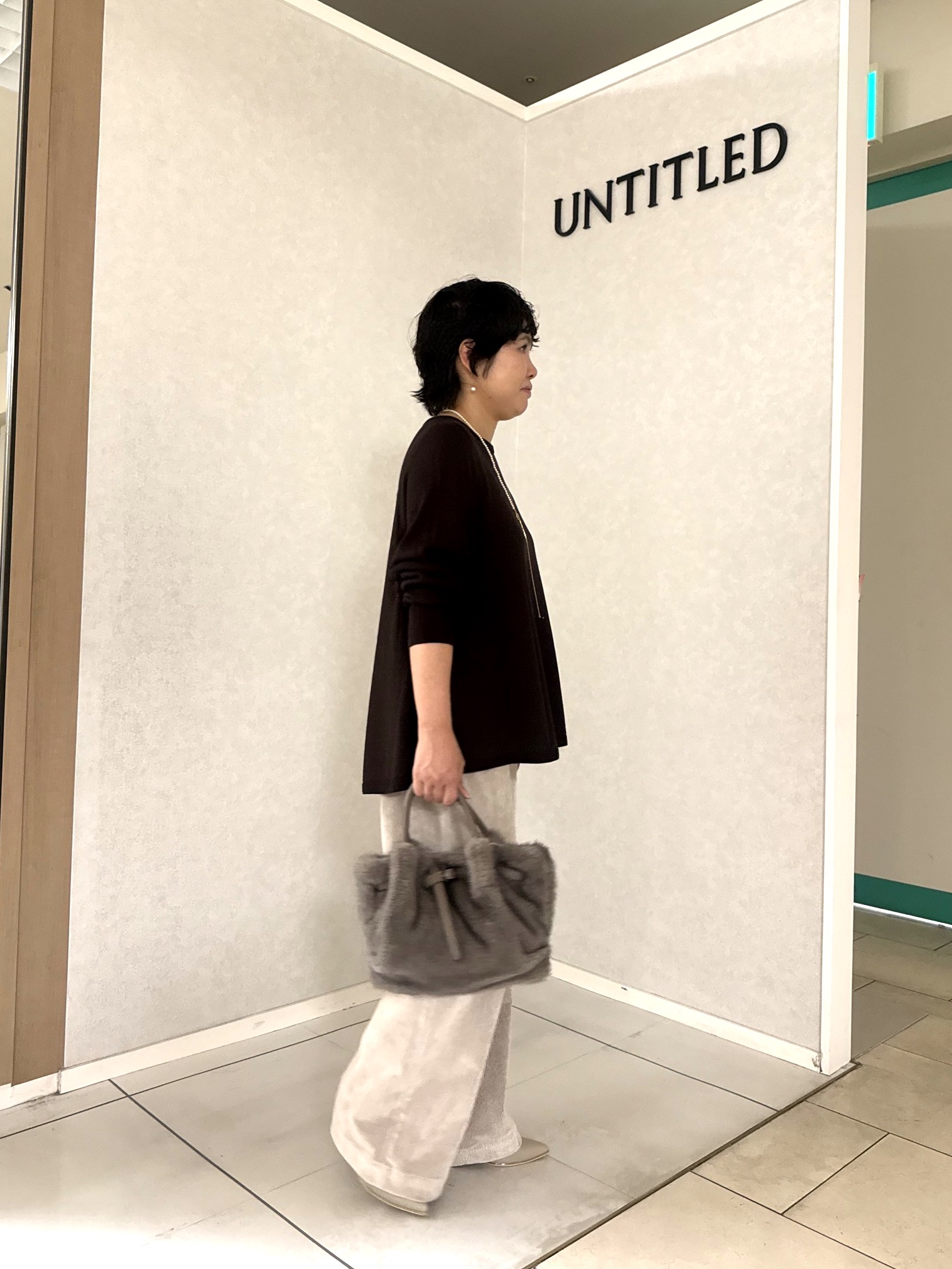 かなこさんの「UNTITLED｜【きれいに体型カバー/8色展開】Aラインシルエットニットプルオーバー」を使ったコーディネート