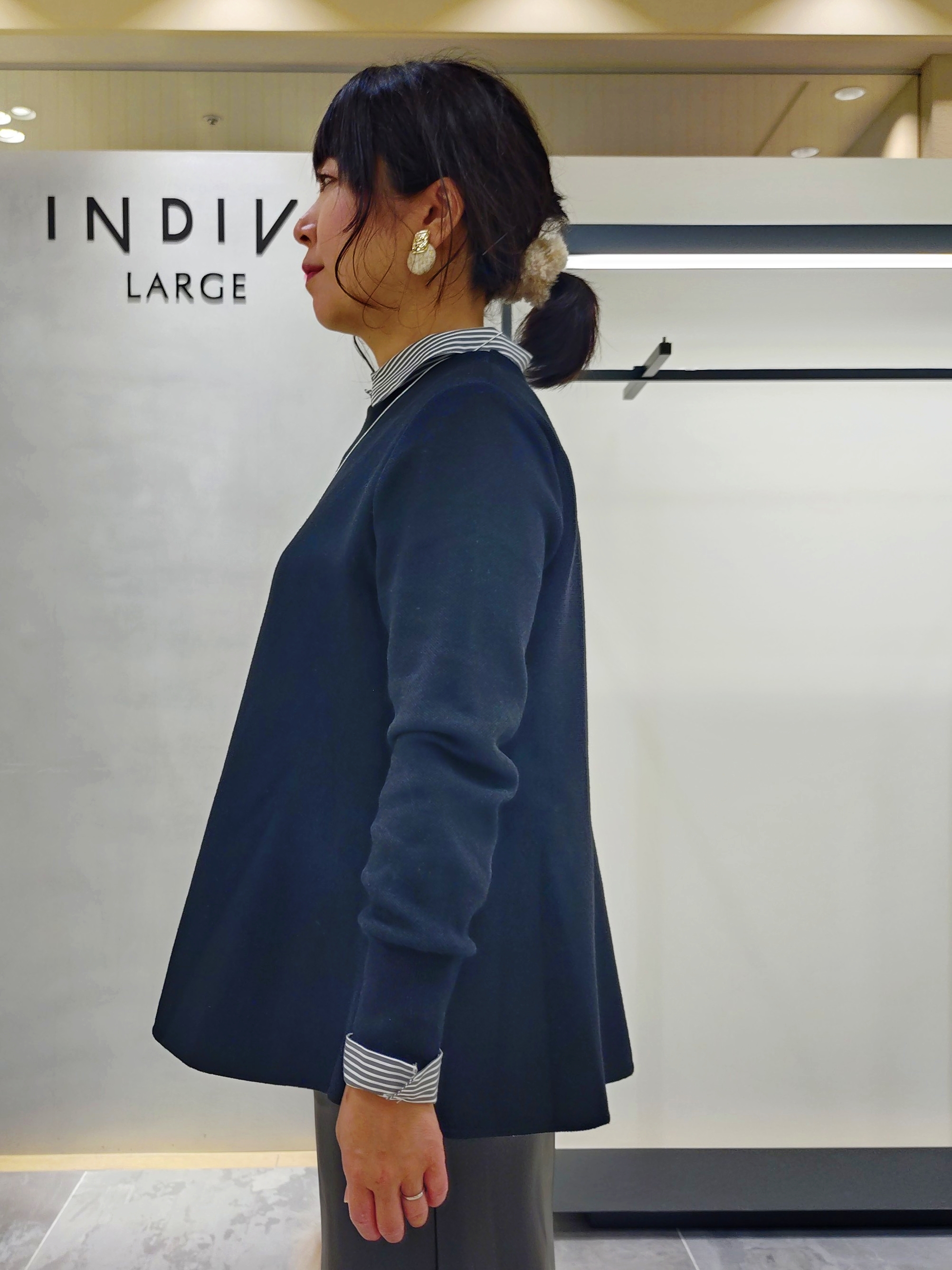 TOMOMIさんの「INDIVI｜【体型カバー／後ろボタン】ジャカードペプラムニット」を使ったコーディネート